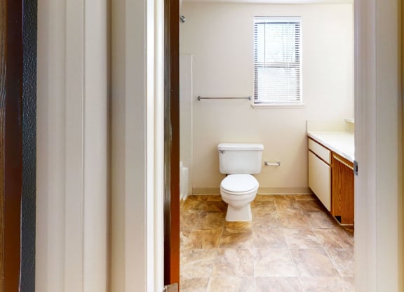 end style bathroom with a window at Windmill Lakes Apartments, Holland, 49424