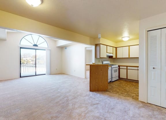 Two bedroom one bath living room with cathedral ceiling at Windmill Lakes Apartments, Holland, 49424