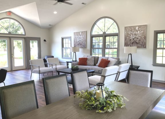 community building with high ceiling and wood flooring at Windmill Lakes Apartments, Holland, 49424