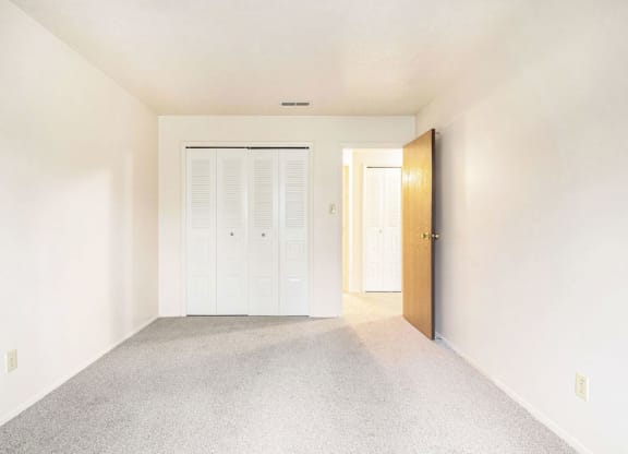 bedroom with large closet at Wingate Apartments, Kentwood