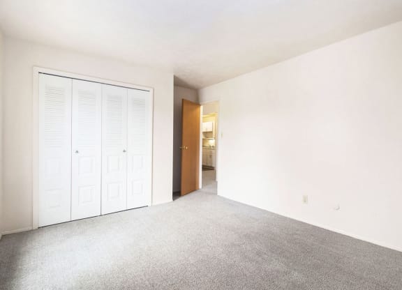 bedroom with large closet at Wingate Apartments, Kentwood