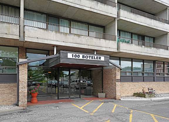 The entrance to a building with the sign 100 Boteler.