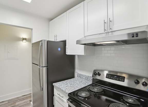 Stainless steel appliances in modern kitchen