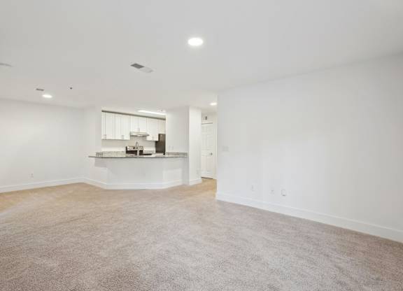 Living room with view of kitchen
