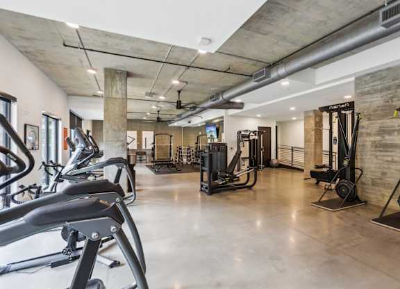A gym with a variety of equipment