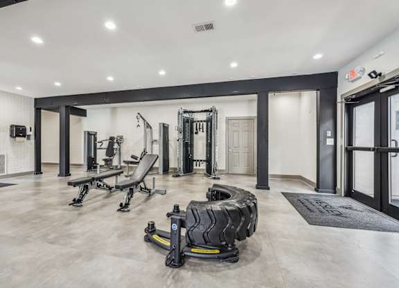 A gym with a variety of equipment