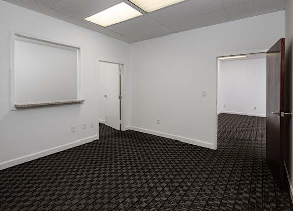 A room with a black and white checkered floor.