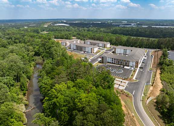 A bird's eye view of Heron Mill apartments with direct access to Sweetwater Creek State Park