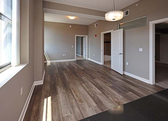 Model Suite with All New LVT Hard Surface Flooring at The Residences at Hanna in Cleveland OH - Living Area