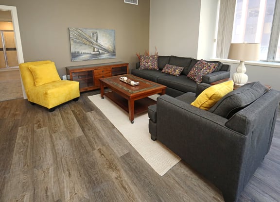 Updated Model Suite with All New LVT Hard Surface Flooring at Residences at 1717 Cleveland OH - Living Area.