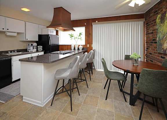 Model Kitchen and Dining Area at Colonial Park Townhomes in Euclid OH