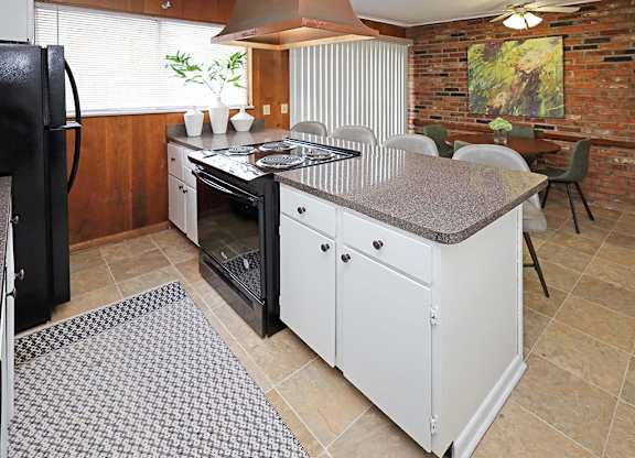 Model Kitchen and Dining Area at Colonial Park Townhomes in Euclid OH