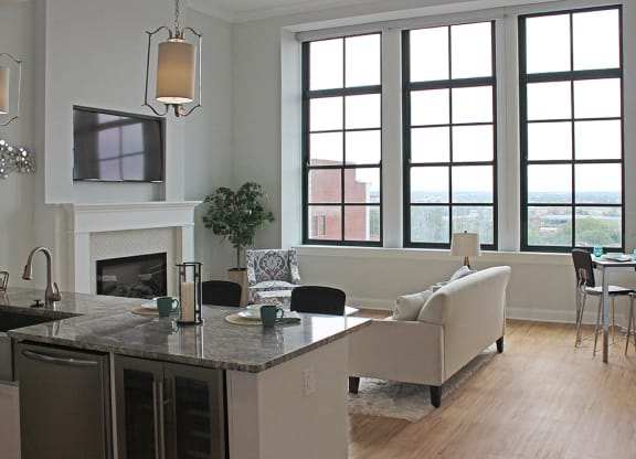 Luxury Vinyl Plank Flooring In Kitchen And Living Room at Residences at Halle, Cleveland