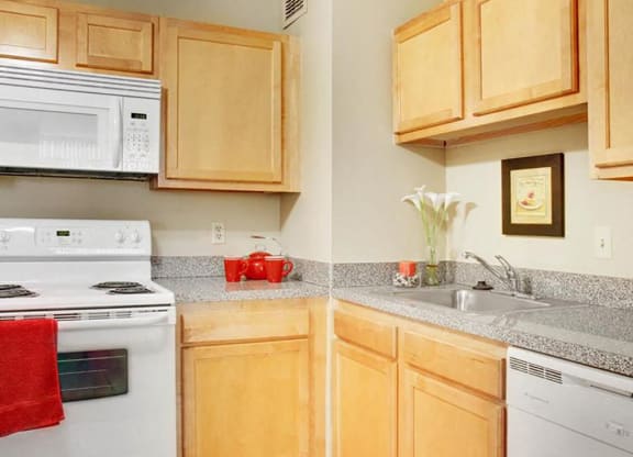 P1 Standard Model Kitchen with White Appliances at Reserve Square, Cleveland, OH