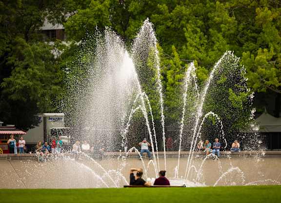Public splash pad fountain with spray features at Axis Seattle Apartments, Seattle
