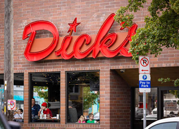 Neighborhood restaurant with red illuminated signage at Axis Seattle Apartments, Seattle, Washington