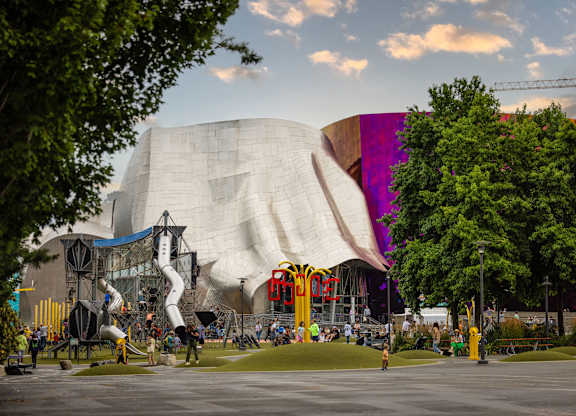 Museum of pop culture with playground and lawn at Axis Seattle Apartments, Washington