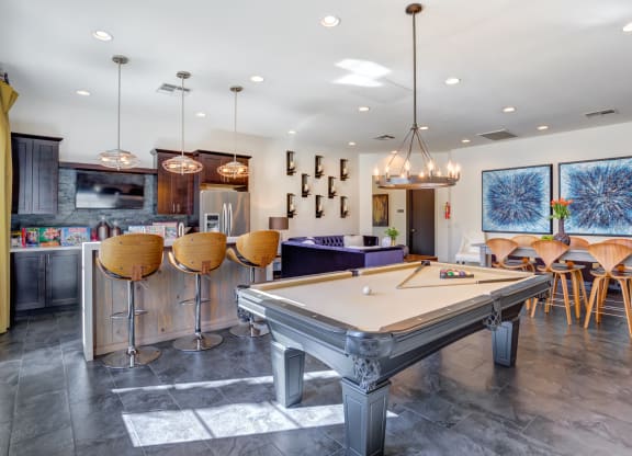 Apartments For Rent in 89147 Spring Valley NV - Alicante - Clubroom Featuring Pool Table, Kitchen, Modern Lighting, Bar Stools and Tables