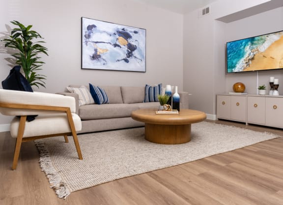 a living room with a couch and a table