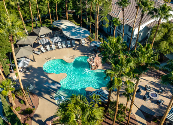 Spring Valley Apartments Spring Valley, NV - Alicante - Ariel Pool Area View Featuring Cabana Seating, Water Feature, Fire Pit Lounge Seating