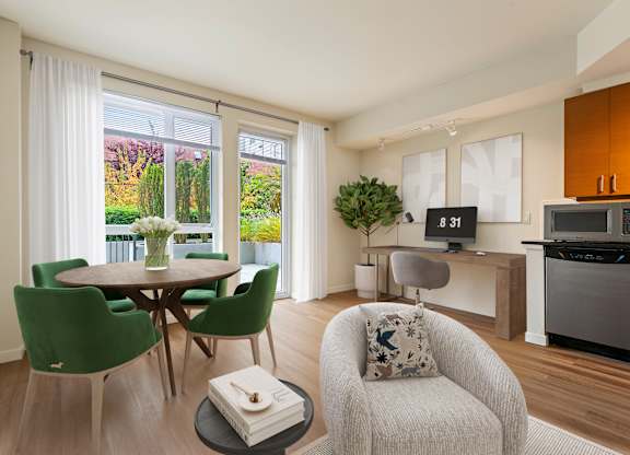 Open living space with dining table and desk area at Axis Seattle Apartments, Seattle