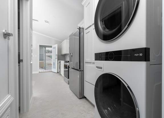 A laundry room with a washer and dryer.