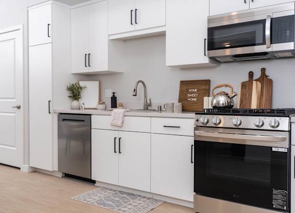 Kitchen with white cabinets and stainless steel appliances