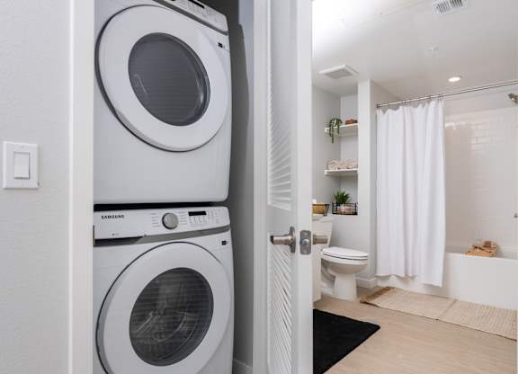 A white washing machine and dryer