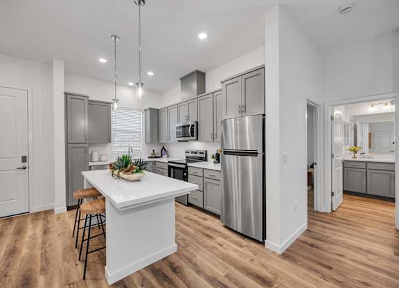 Kitchens With High-Quality Countertops at Estia Roseville Apartments, Roseville, California