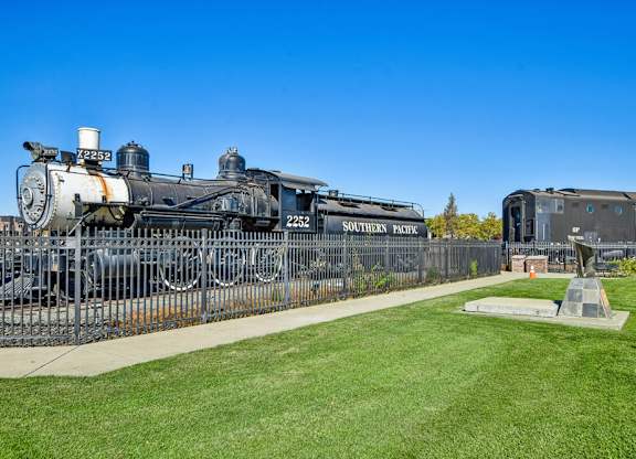 A black steam locomotive with the number 2253 and the words