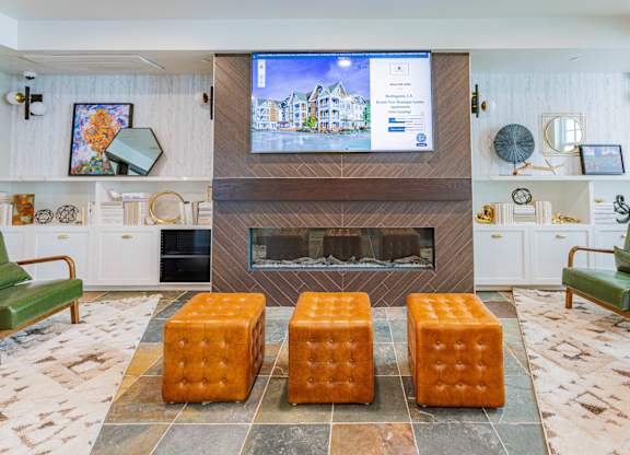resident lounge with HD tv and fireplace at Bayswater Apartments, Burlingame, 94010
