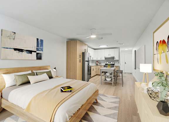 A bedroom with a bed, nightstand, and a painting on the wall.