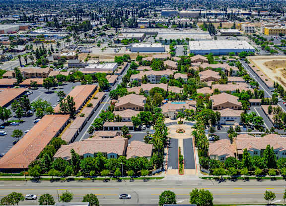A bird's eye view of a residential area with a central square.