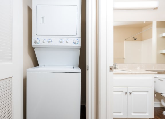 a laundry room with a washer and dryer