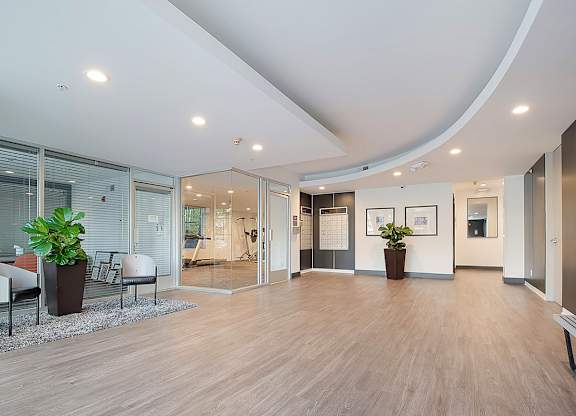 A spacious office with wood floors and a curved ceiling.at Plaza Lafayette, Los Angeles, CA  