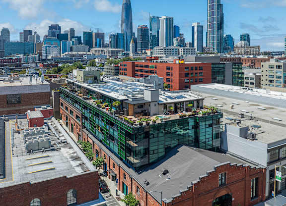 A cityscape with a mix of modern and older buildings.