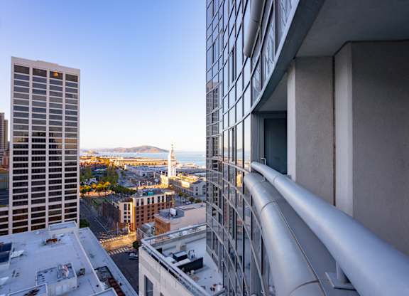 Balcony with view of the city at Towers at Rincon, San Francisco, CA