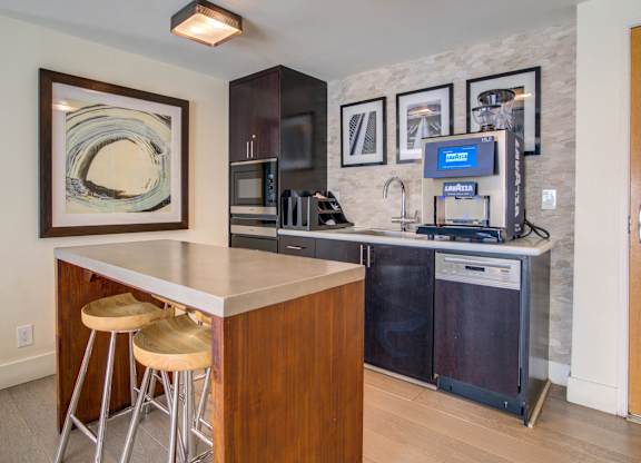 Coffee machine in business and living lounge at Towers at Rincon, San Francisco