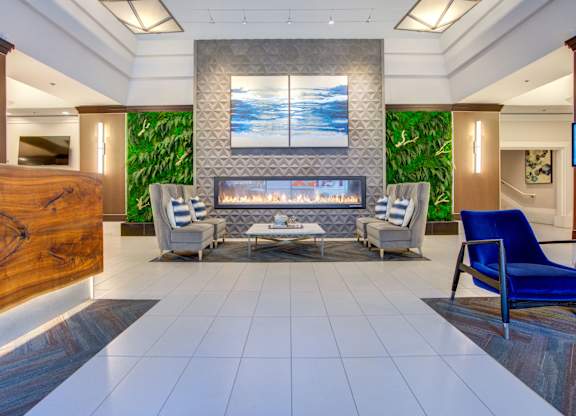 Modern-styled living room with a fireplace at Towers at Rincon, San Francisco, California