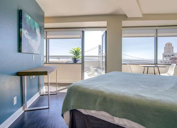Comfortable Bedroom With Large Window at Towers at Rincon, California , 94105