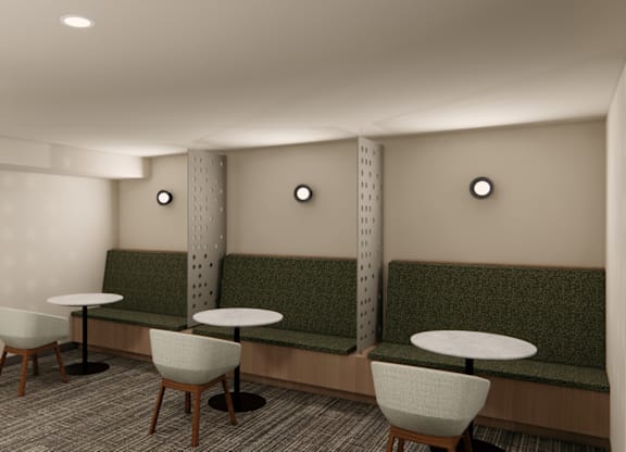 Shared lounge area with booth seating and tables at Axis Seattle Apartments, Seattle, WA