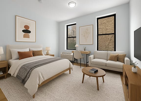 A bedroom with a large bed and a couch.