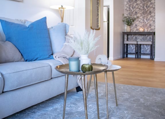 a living room with a couch and a coffee table