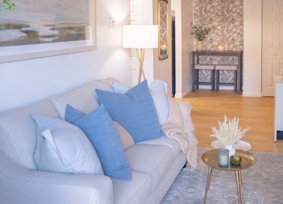 a living room with a couch and a coffee table