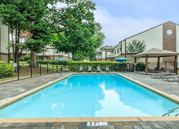 A swimming pool with the number 3 on the ground.