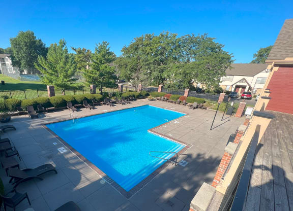 a view of the pool from the roof of a house at Coach House Apartments, Kansas City