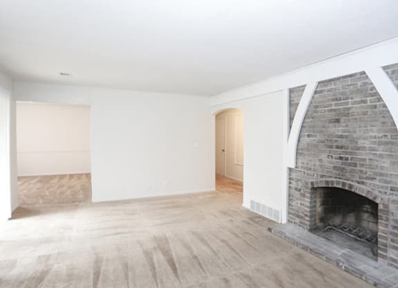 Living Room with fireplace look around at Canyon Creek Apartments, Missouri, 64132