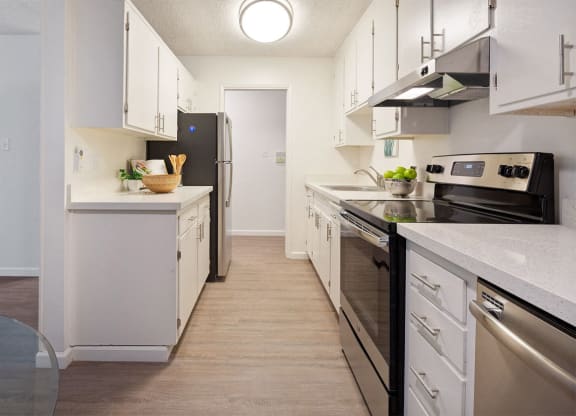White Cabinetry And Appliances In Kitchen at Marine View Apartments, California, 94501