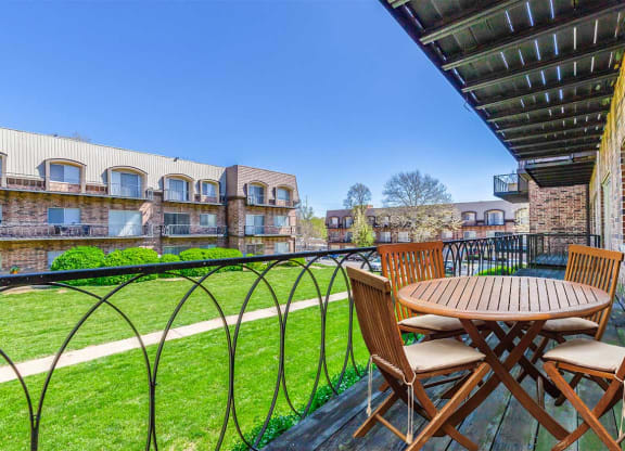 2x1H Balcony with Table and Chairs at Waldo Heights, Missouri
