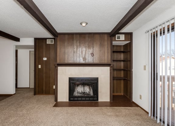 West One Bedroom Living Room and Fireplace at Raintree Apartments, Topeka, KS, 66614